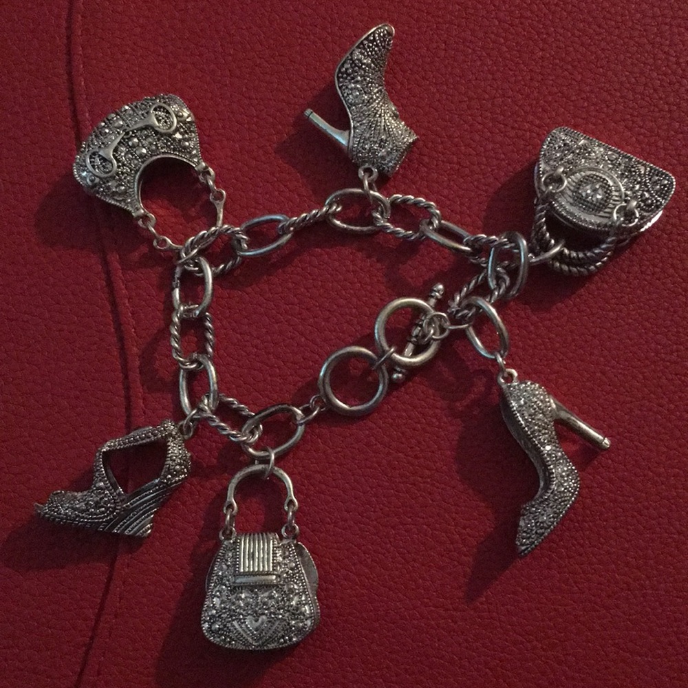 Silver tone charm bracelets